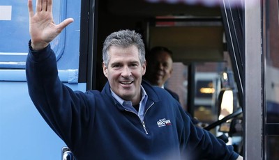 
              FILE - In this Nov. 4, 2012, file photo, then-Sen. Scott Brown, R-Mass., waves to supporters from his bus after a campaign rally at Faneuil Hall in Boston. Three years ago, Brown was a 